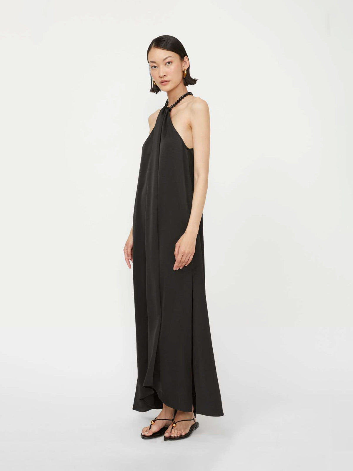 Neckholder-Kleid mit Perlenverschluss - Tempel Hamburg