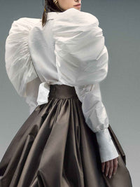 Taft-Bluse mit dramatisch gebauschten Ärmeln - Tempel Hamburg